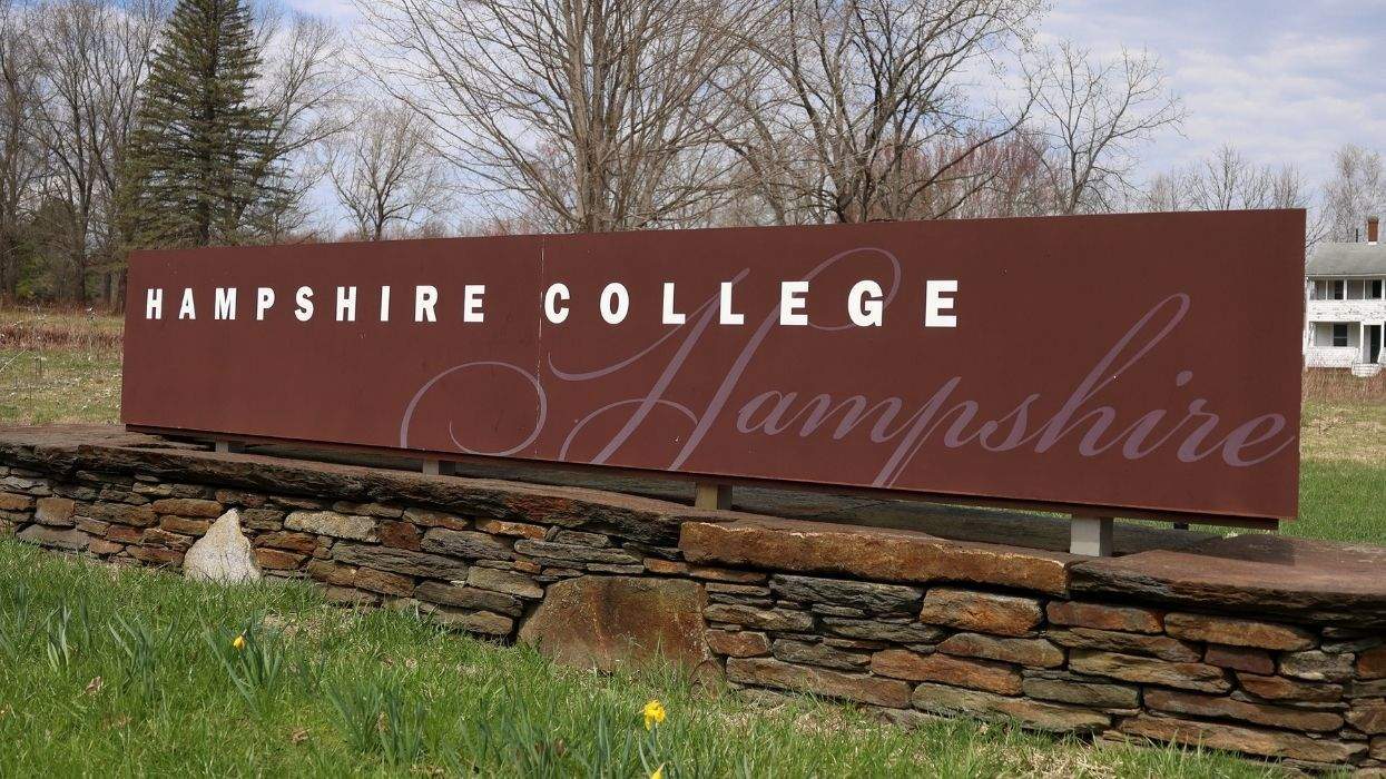 hampshire college sign on a field