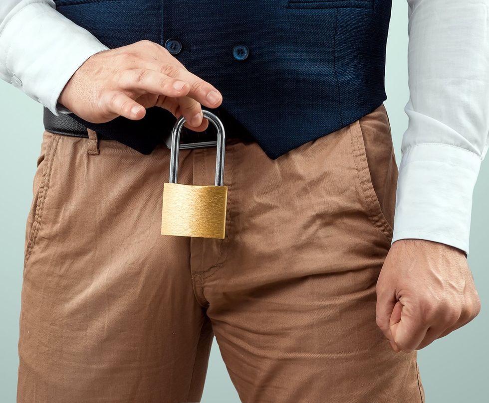 hand holding metal lock