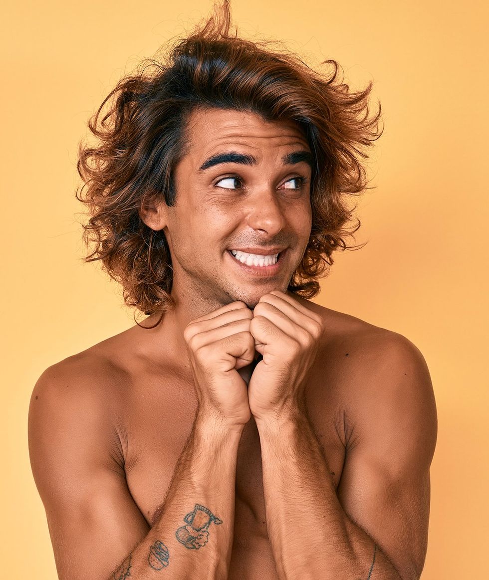 handsome guy tan with a few tattoos