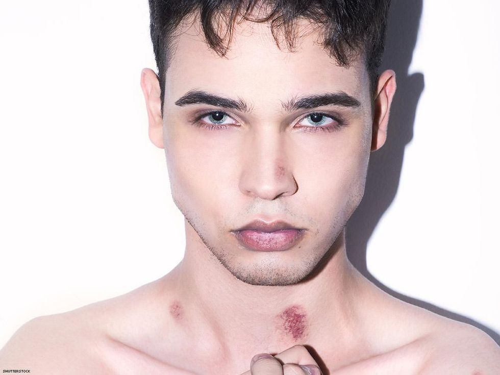 handsome man blue eyes with hickeys on his neck