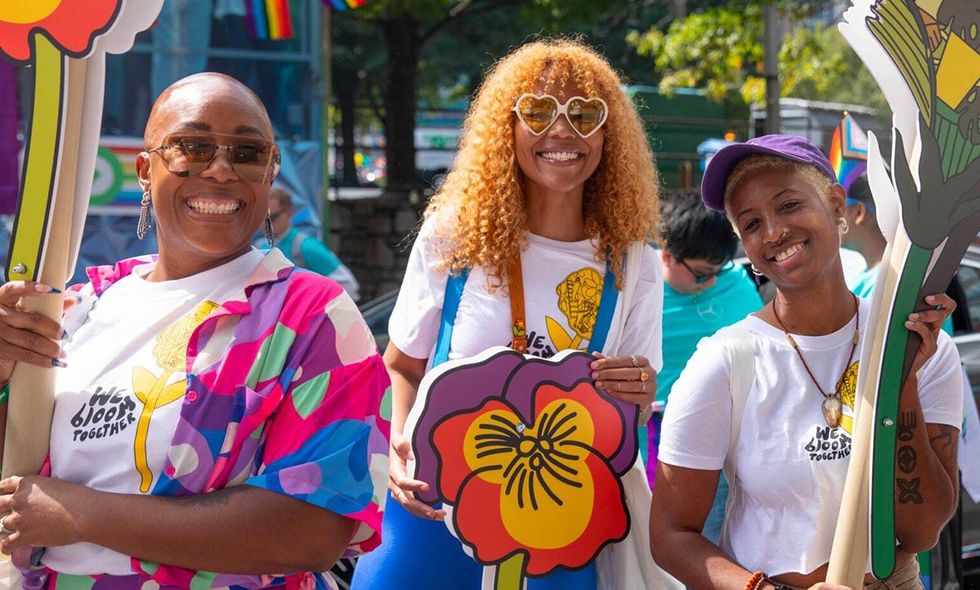 happy smiling colorful people attending lgbtq pride event