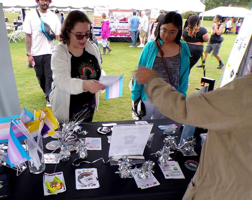 He She Ze and We info table at Richmond RVA LGBTQIA Pridefest 2025