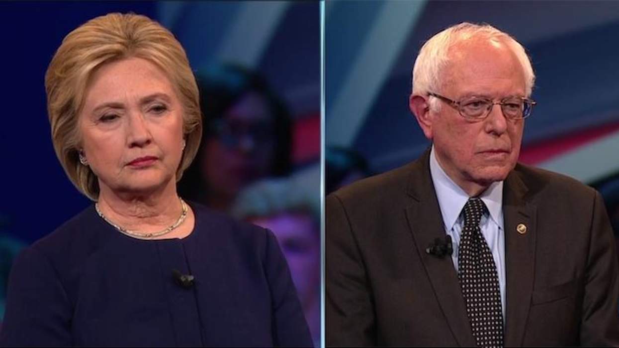 Hillary Clinton and Bernie Sanders respond to voter questions at a Democratic town hall in Columbus