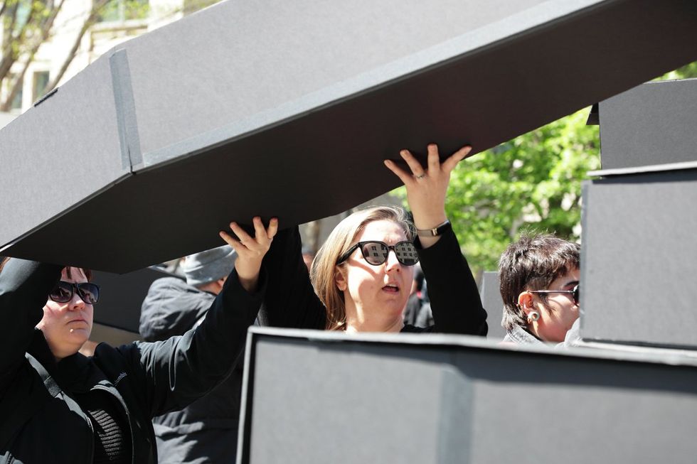 HIV and AIDS activists hold coffin delivery to protest PEPFAR cuts at State Department building in Washington, D.C., April 17, 2025