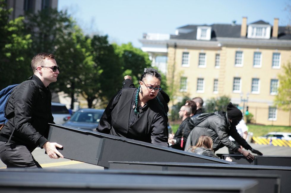 HIV and AIDS activists hold coffin delivery to protest PEPFAR cuts at State Department building in Washington, D.C., April 17, 2025