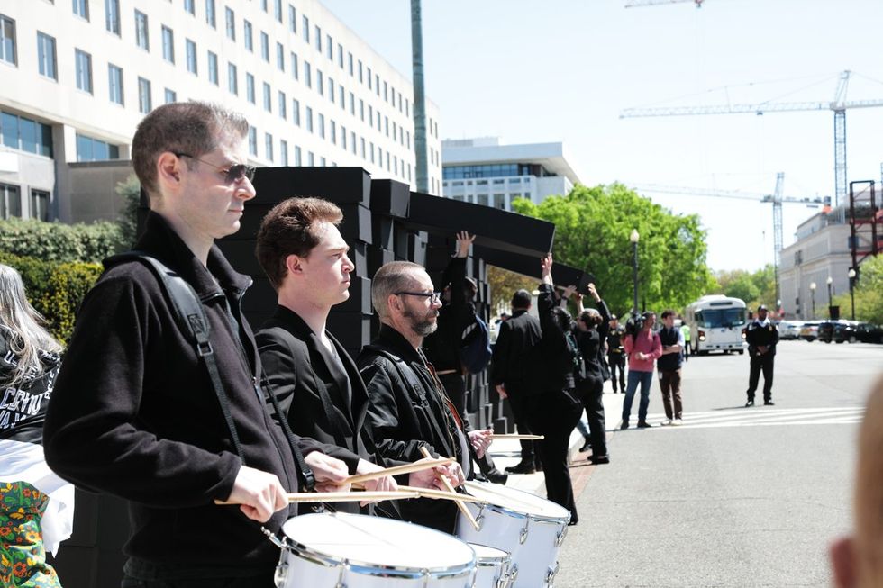 HIV and AIDS activists hold coffin delivery to protest PEPFAR cuts at State Department building in Washington, D.C., April 17, 2025
