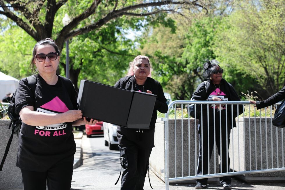 HIV and AIDS activists hold coffin delivery to protest PEPFAR cuts at State Department building in Washington, D.C., April 17, 2025