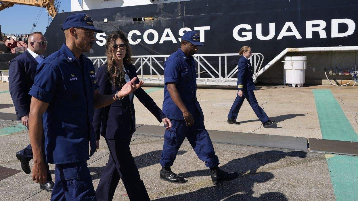 homeland security secretary kristi noem and coast guard members