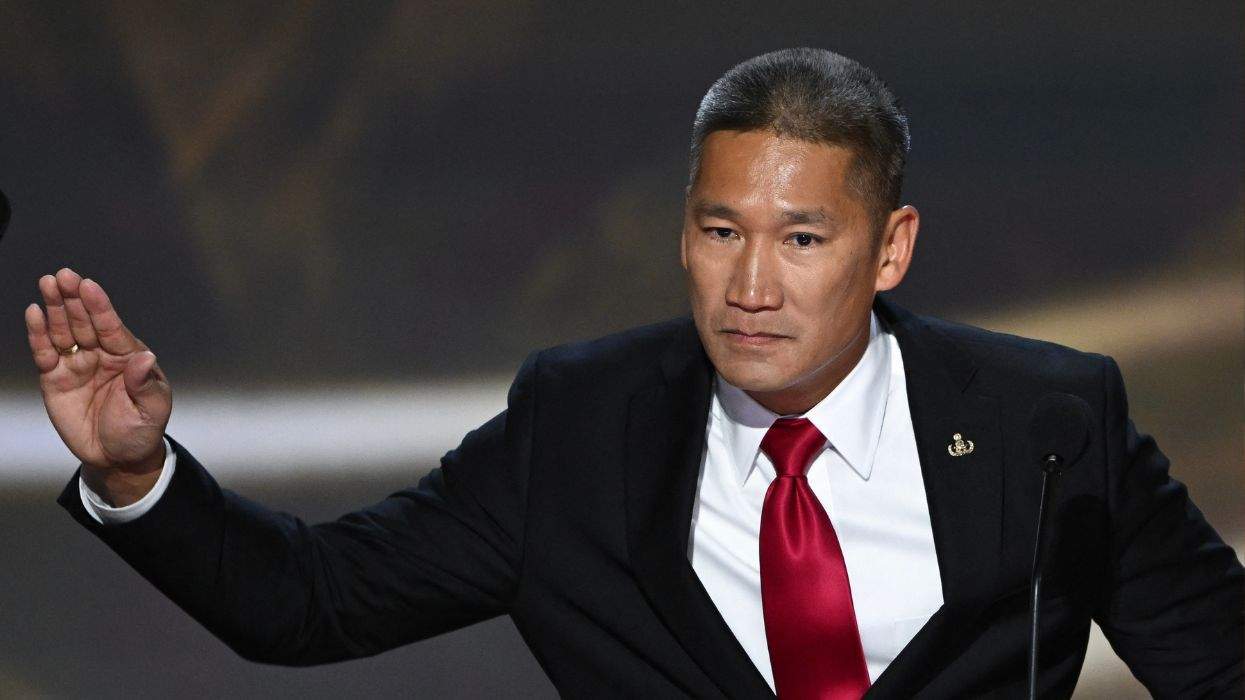 Hung Cao gestures during speech