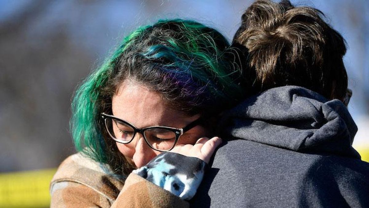 Image of mourners at Club Q memorial in Colorado Springs