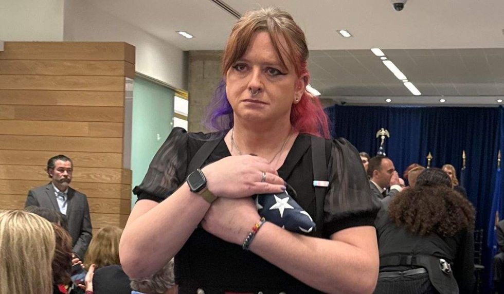 jada mcguire receives American flag