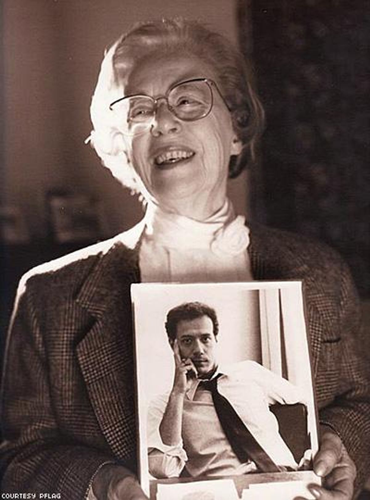 Jeanne-manford-holding-photo-of-morty-manford-circa-1993x400