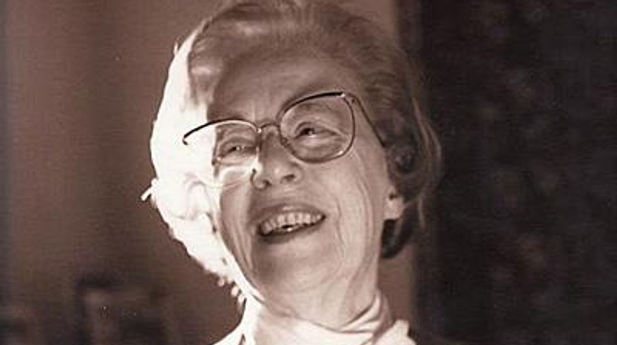 Jeanne-manford-holding-photo-of-morty-manford-circa-1993x400