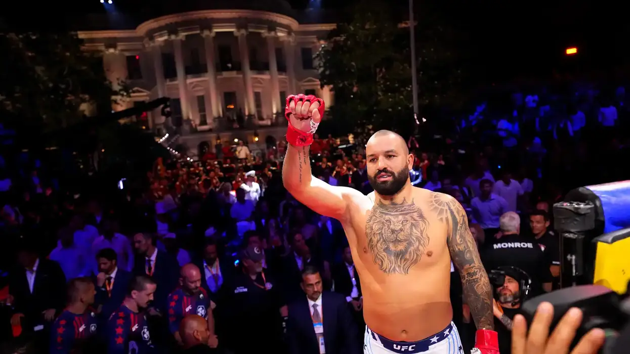 Josh Hokit acknowledges the crowd against Derrick Lewis in a heavyweight fight during the UFC Freedom 250 event on the South Lawn at the White House on June 14, 2026 in Washington, DC.