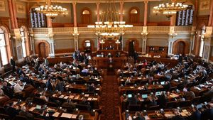 Kansas lawmakers override governor's veto of anti-trans 'bathroom bounty' bill