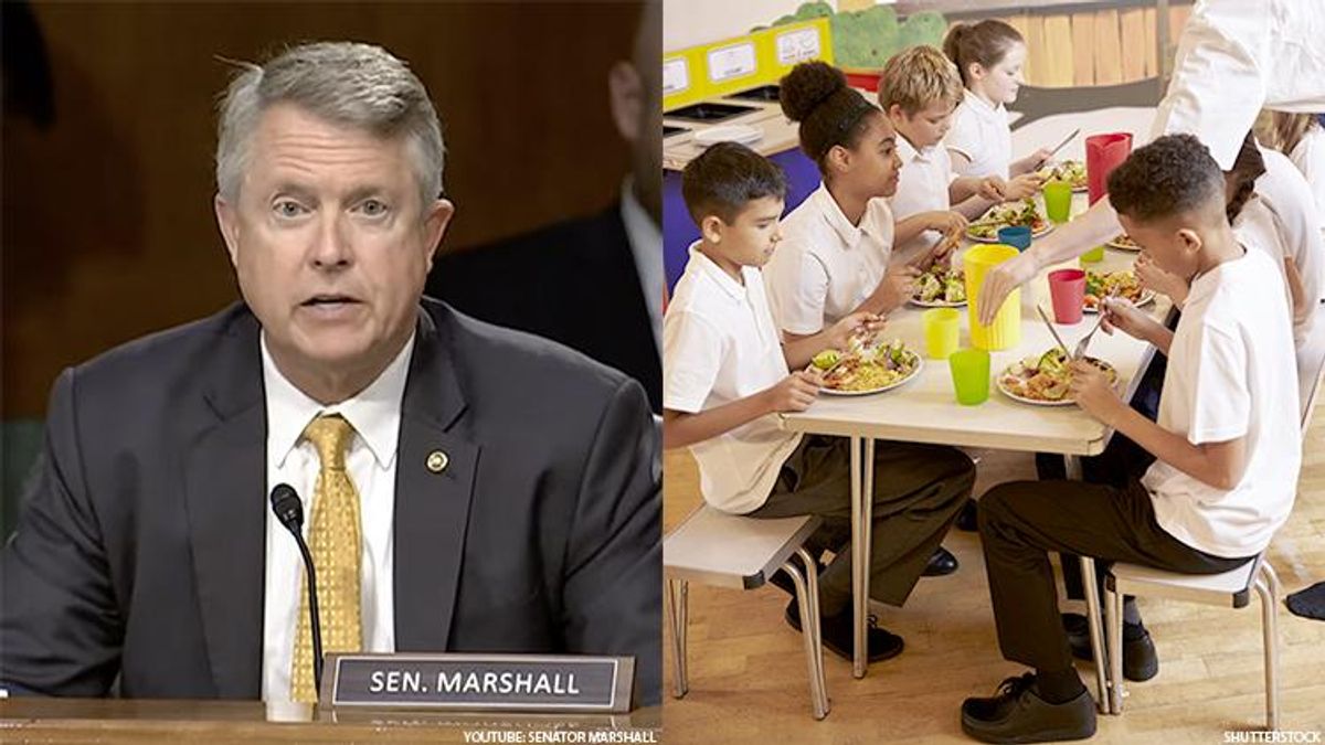 Kansas Senator Marshall next to a group of children eating school lunch.