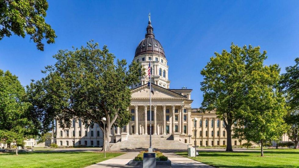 Transgender woman defies Kansas bathroom law inside state Capitol