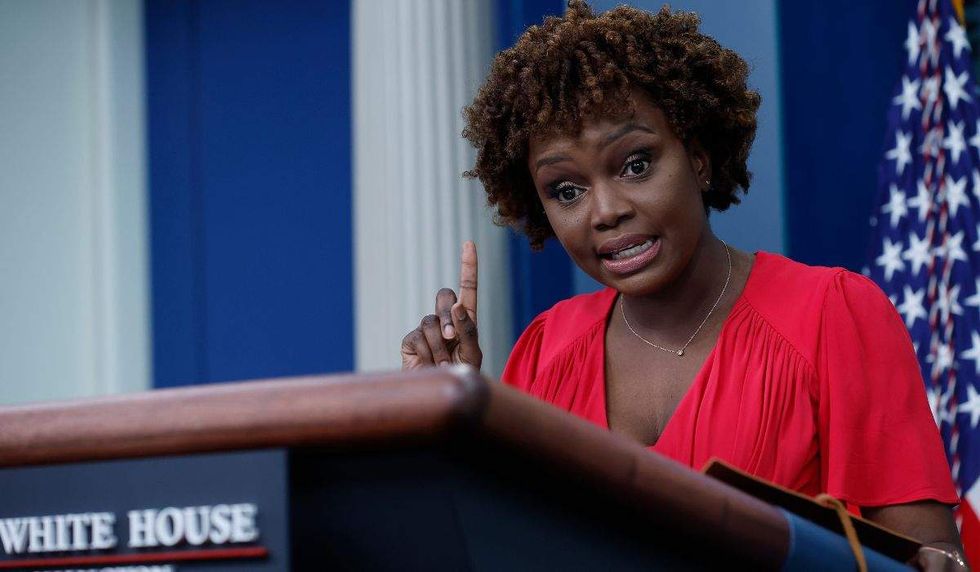 karine kean-pierre speaking with a ringer raised