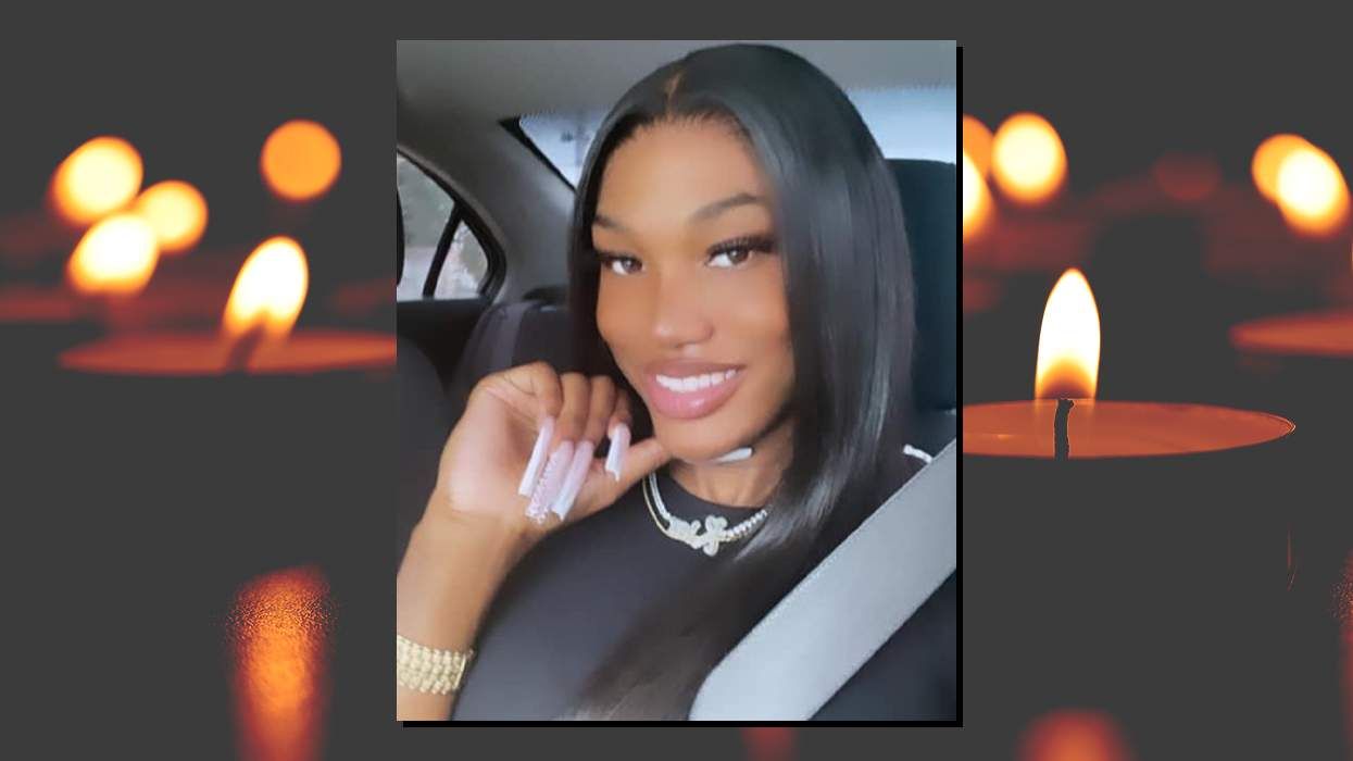 Kier Solomon portrait with background of memorial candles