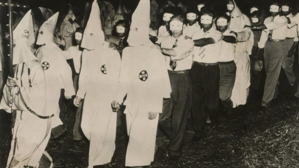 ​Ku Klux Klan initiation at Stone Mountain near Atlanta, Georgia. 