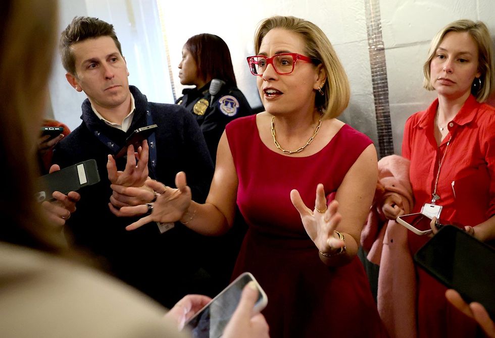 Kyrsten Sinema speaking to the press