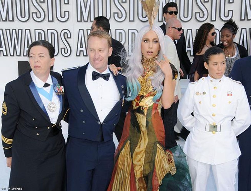 Lady Gaga walks carpet with gay soldiers. (2010)