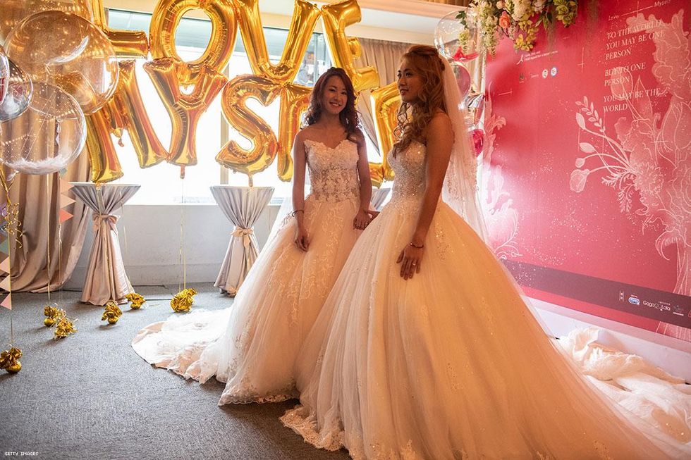 Lesbian couple Amber (L) and Huan Huan