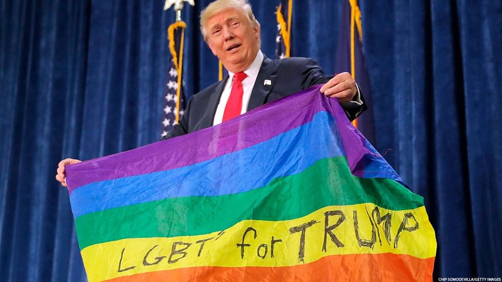 LGBT for Trump flag with the former president holding it