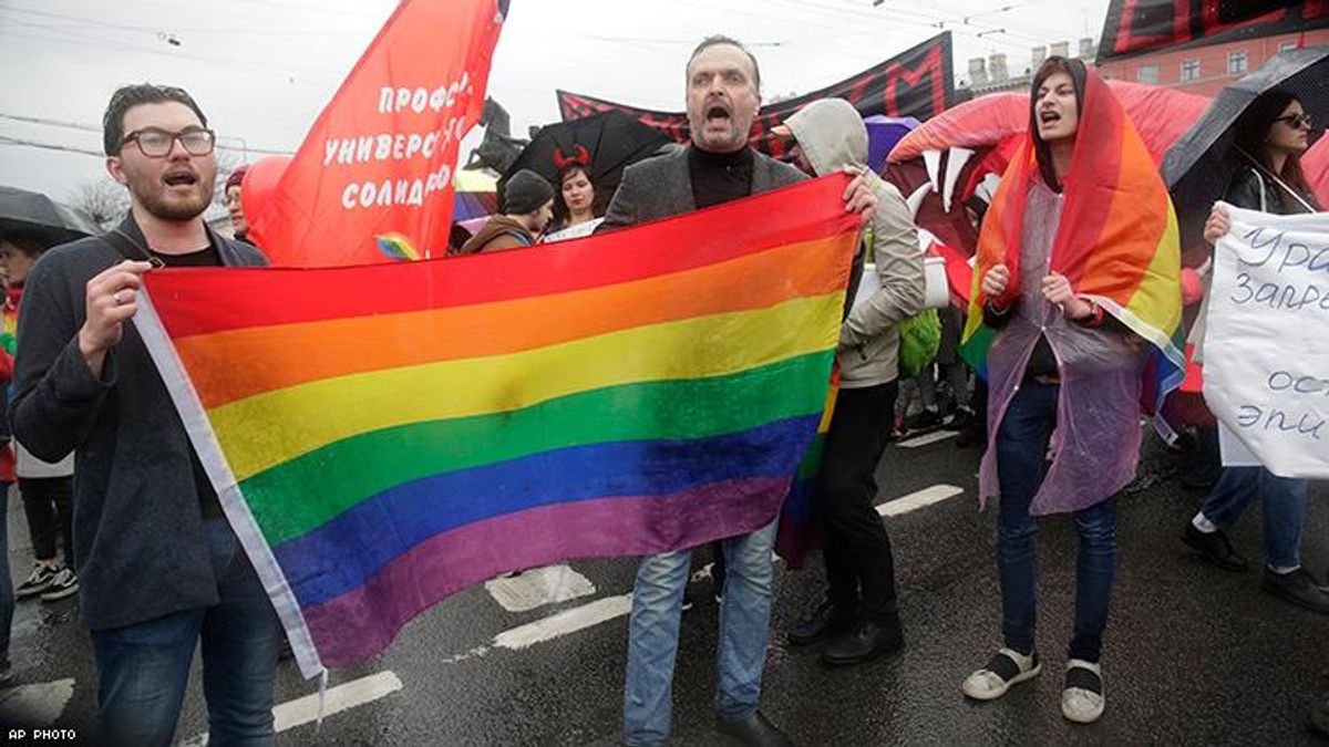 LGBT rights activists attend a May Day rally in St Petersburg.