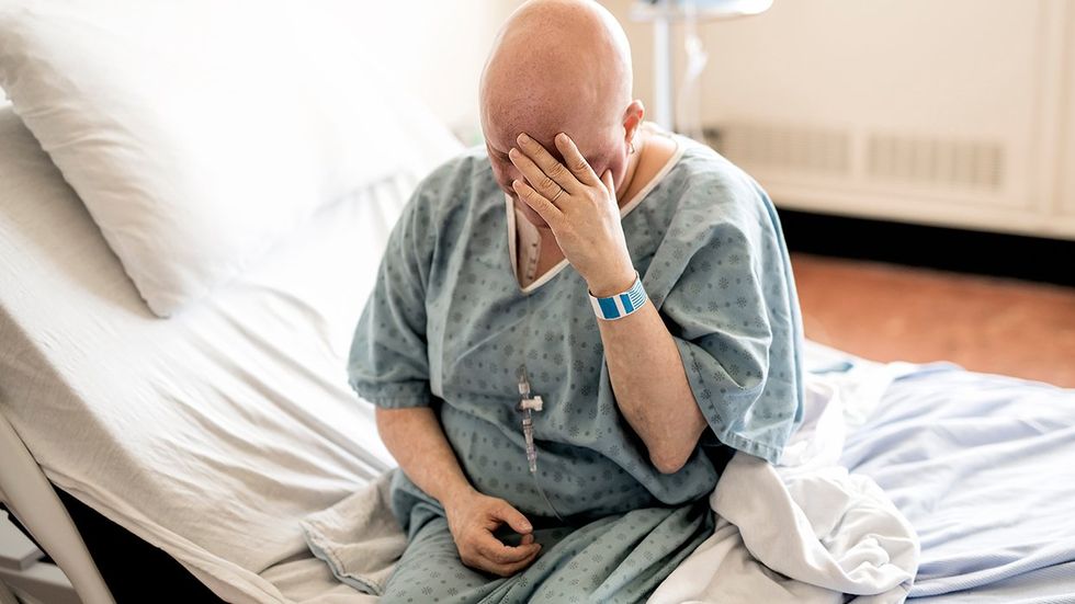 LGBTQ cancer patient sick hospital bed