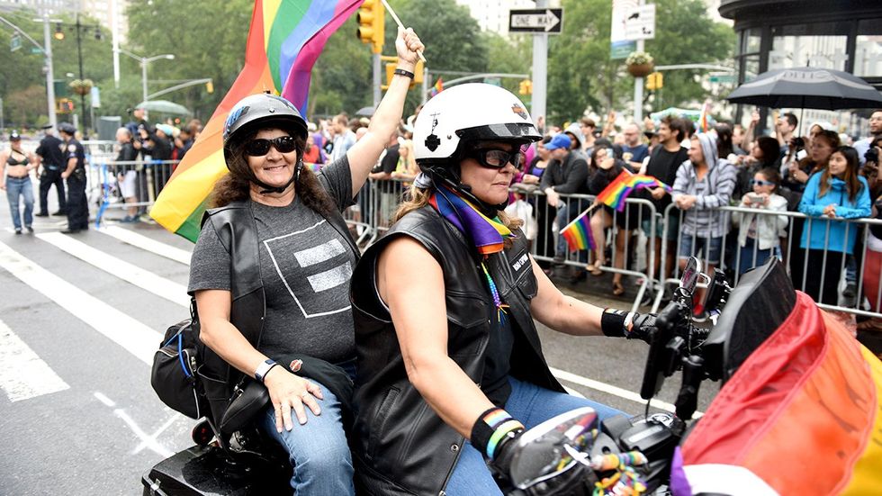 lgbtq pride parade dykes on bikes hrc equality shirt rainbow flags