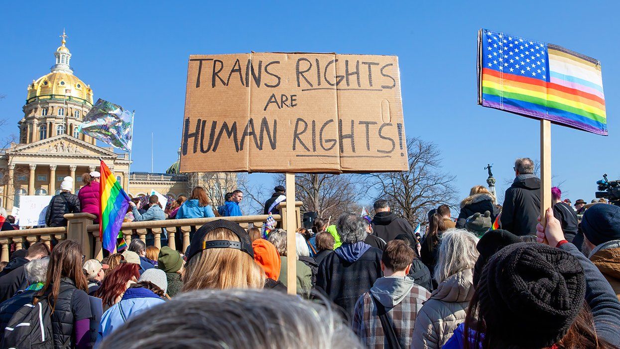 LGBTQ rights support rally Iowa State Capitol signs Trans Rights Are Human Rights Rainbow American Flag