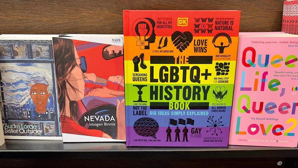 LGBTQ+ themed books on a library shelf