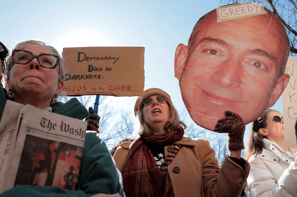 Local D.C. residents who read the Washington Post joined members of the guild to protest during a rally outside the Washington Post office building on February 05, 2026 in Washington, DC.
