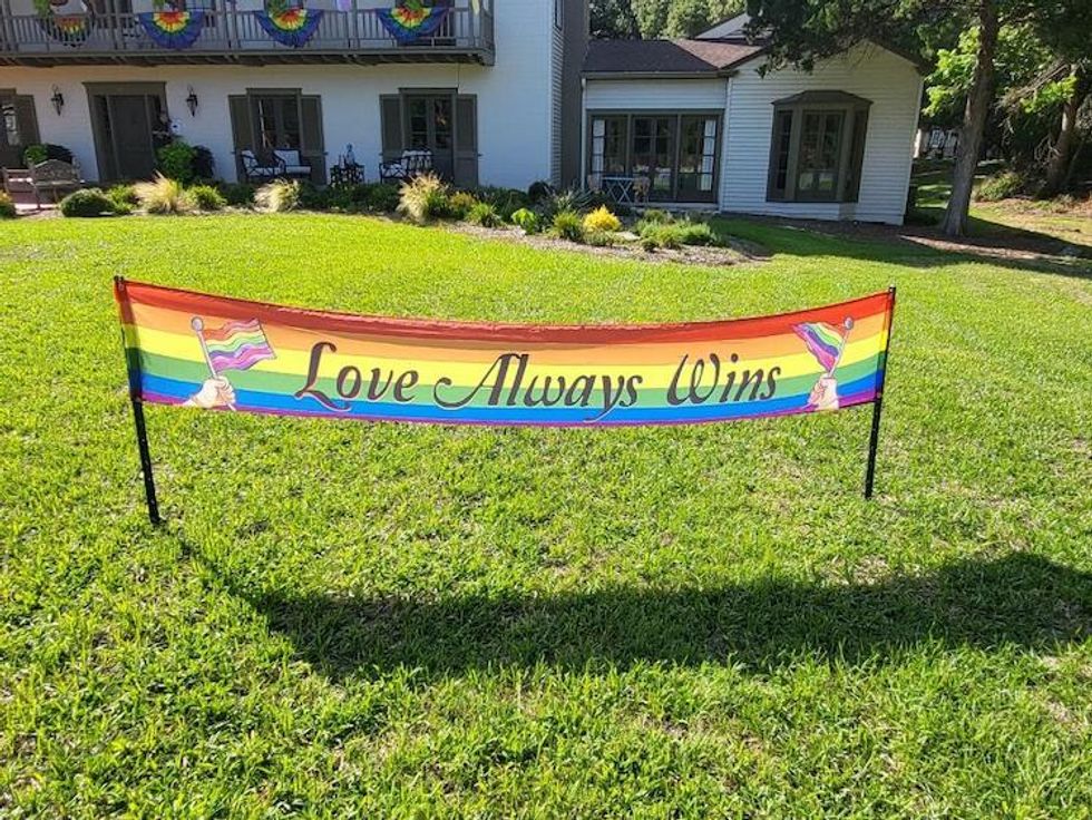 Love Always Wins banner