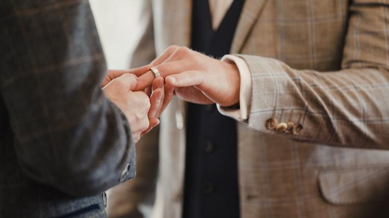 Male couple marrying