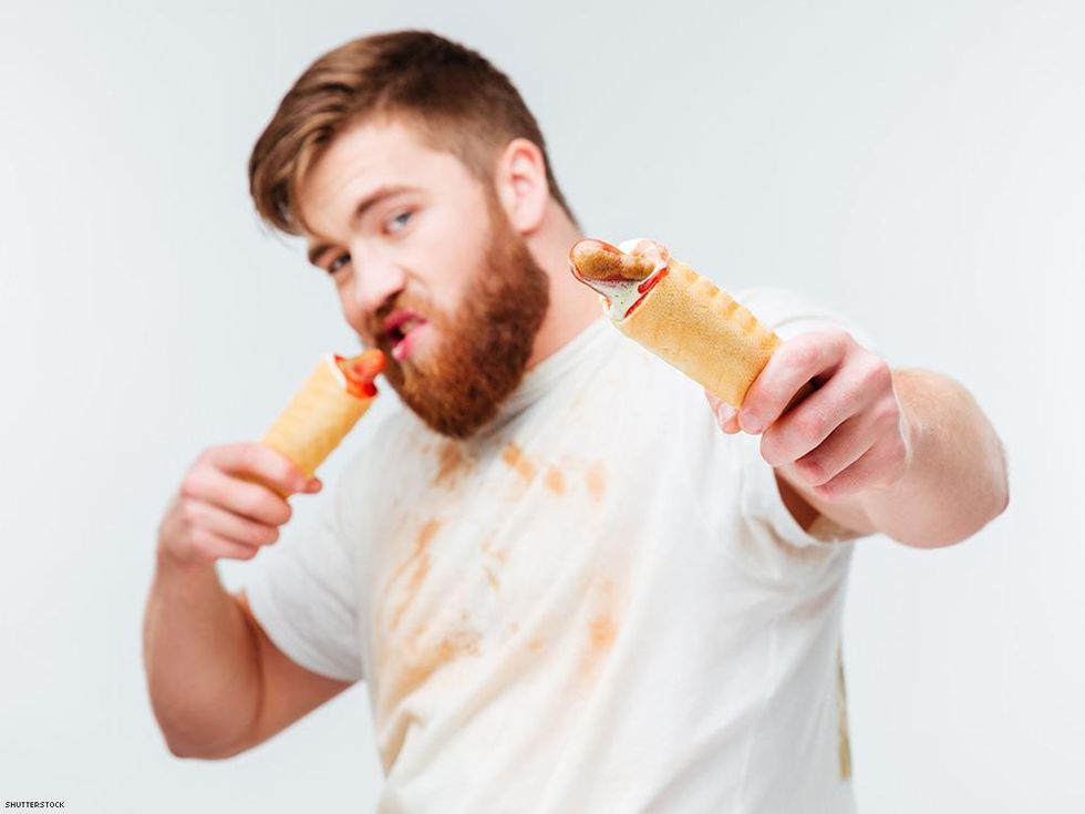 man eating weird food