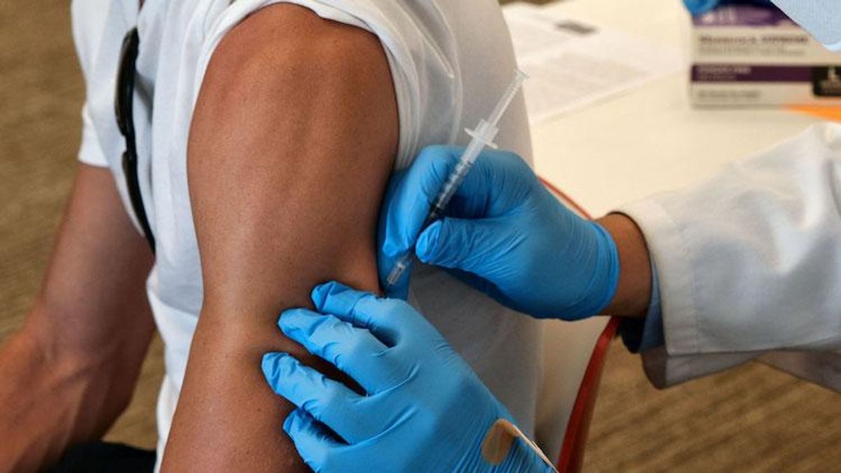 Man receiving monkeypox vaccine