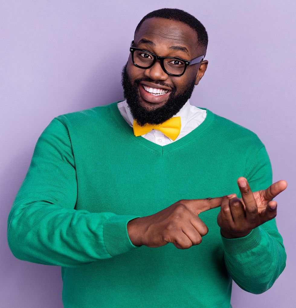 man with beard and bowtie counting fingers