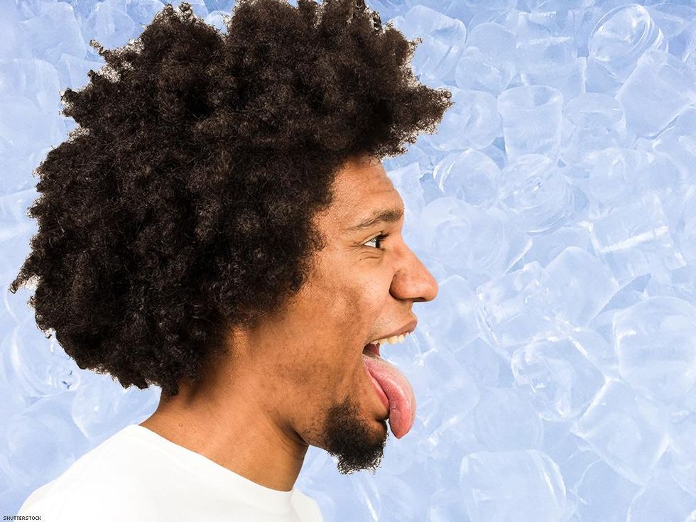 man with his tongue out with ice background