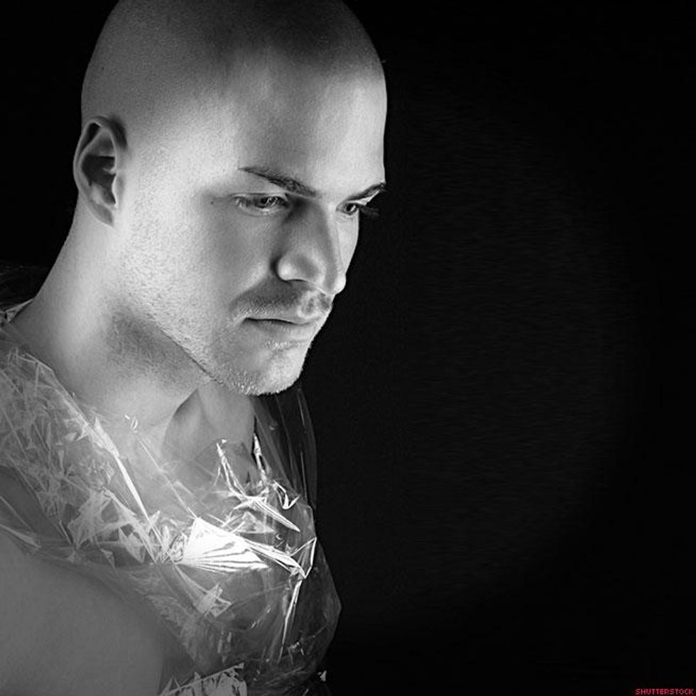 man with plastic wrapped around his chest