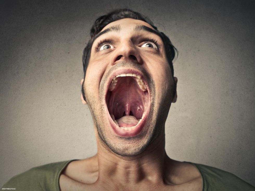 mans face exaggerated mouth open