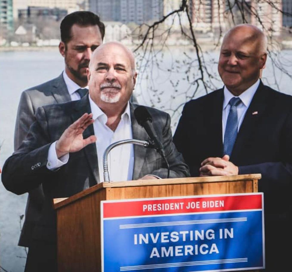 Mark Pocan profile speaks investing in america podium