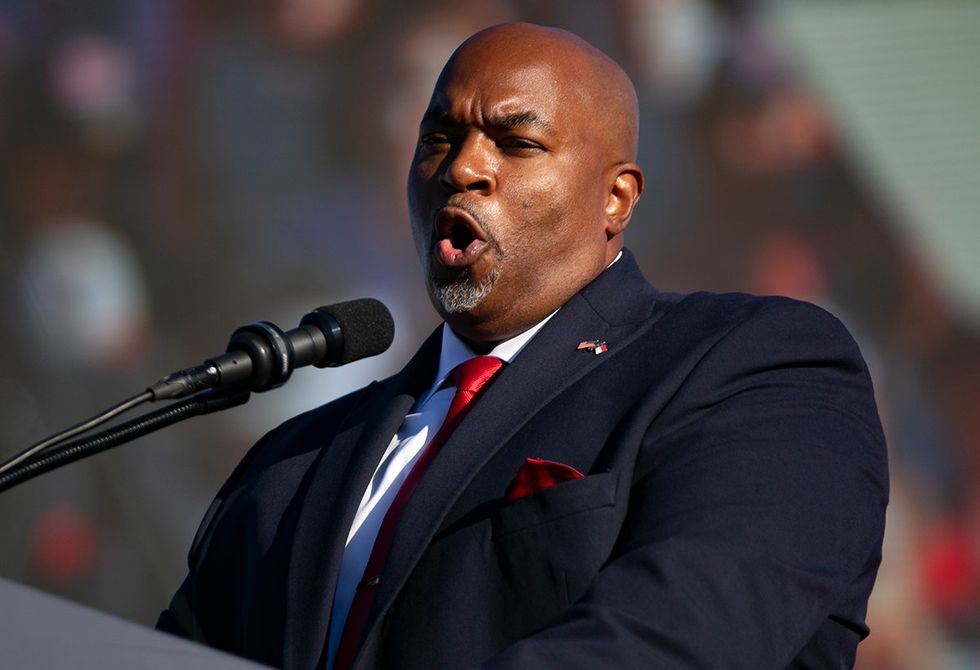 Mark Robinson Crazy Quotes speaking at a podium