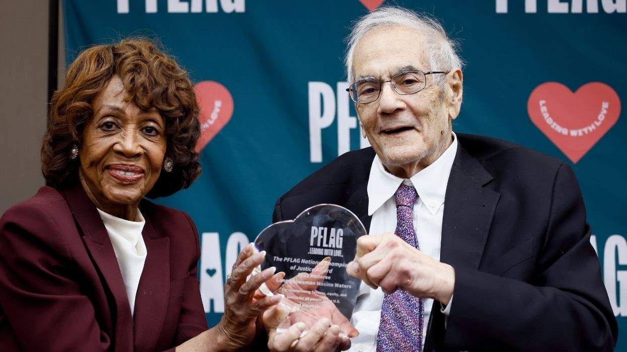 Maxine Waters and Barney Frank hold PFLAG award in dc