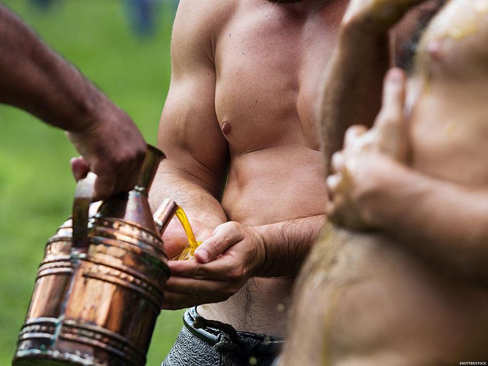 men testing olive oil