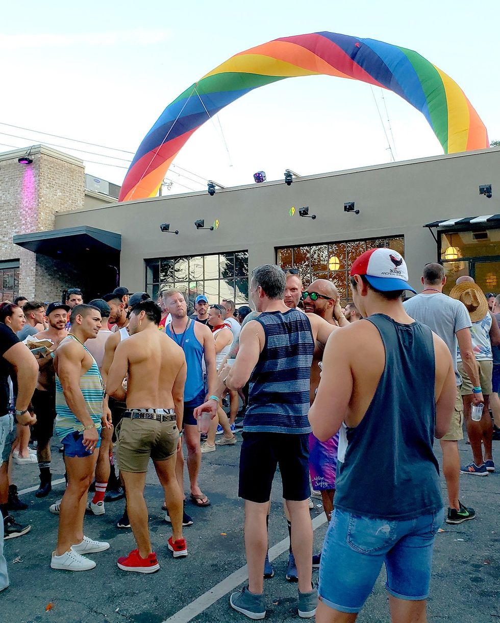 Midtown Atlanta Georgia USA 2018 Clouds of People Dancing happy gay pride day at Piedmont park