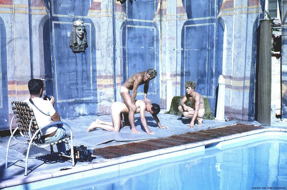 Mike Scott shoots Bob Mizer (far left) at work.