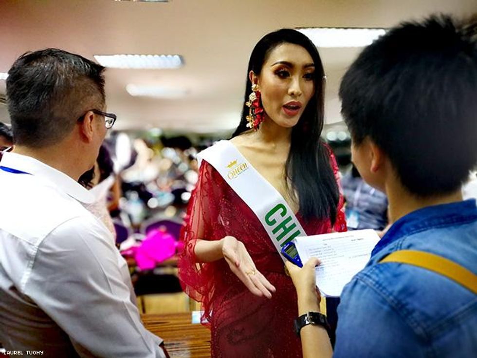 Miss China Yaya talks to reporters backstage