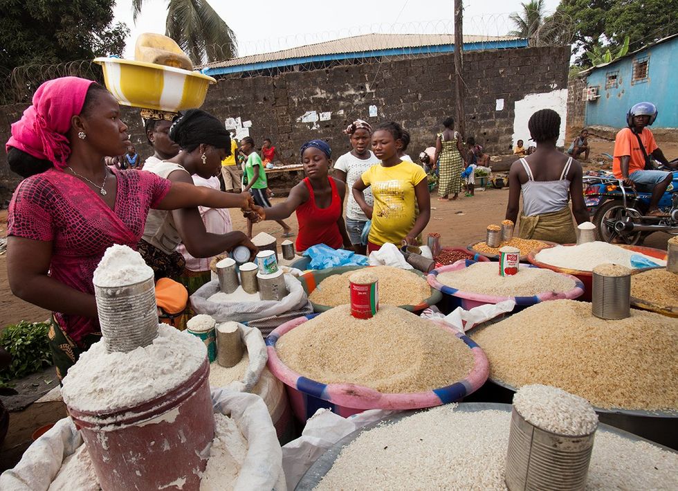 Monrovia Liberia Women sell grains roadside stand
